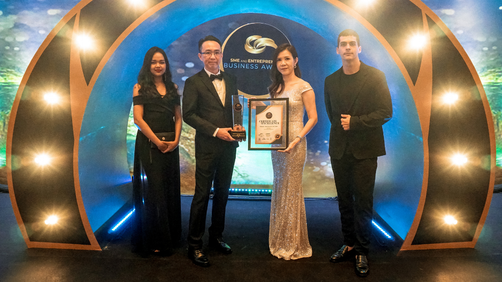 Shinjiru team poses with the awards given by SME and Entrepreneurs Business Award